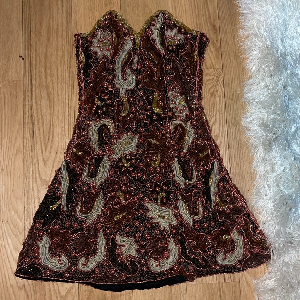 Vintage dress and very snug fit.